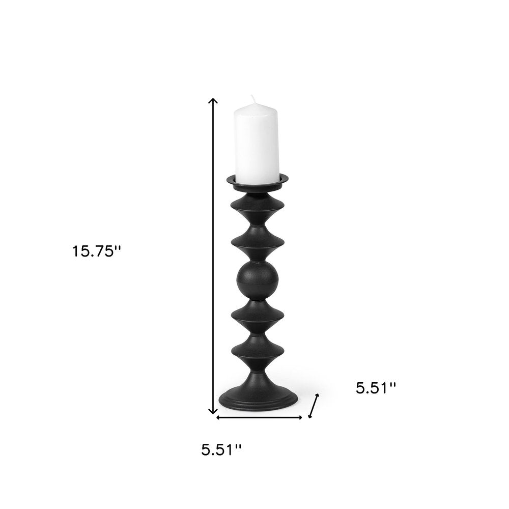 16" Black Metal Tabletop Pillar Candle Holder. Candle holder isolated on a plain white background, in a black metal finish.