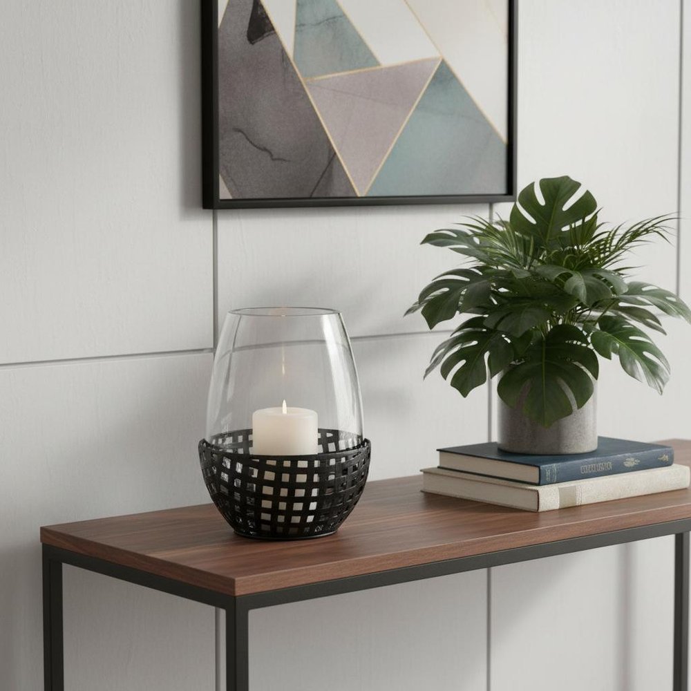8" Black Woven Metal And Glass Tabletop Hurricane Candle Holder in a home interior