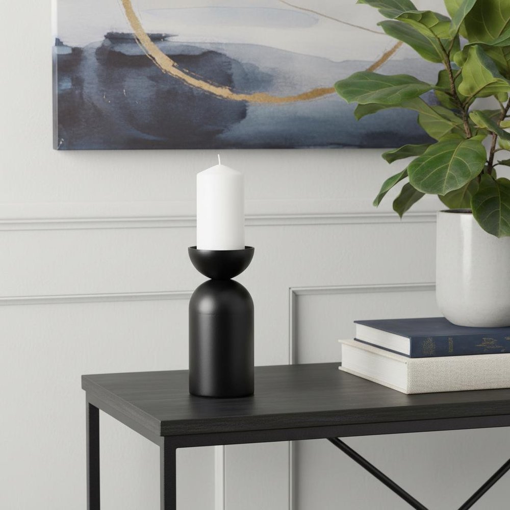 9" Black Metal Tabletop Pillar Candle Holder in a home interior
