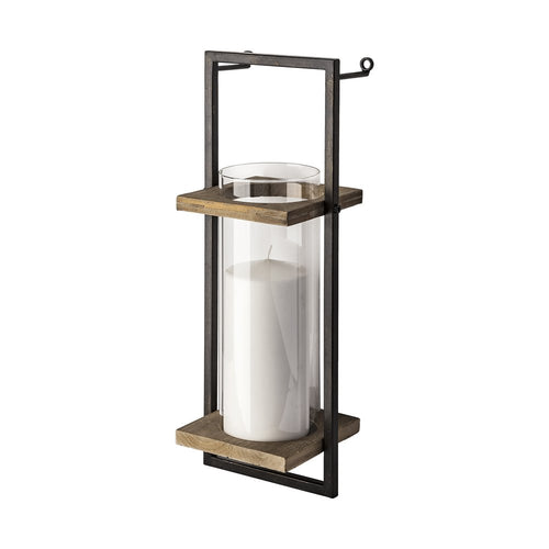 Black and bronze distressed geometric metal and glass wall sconce candle holder with a white pillar candle.
