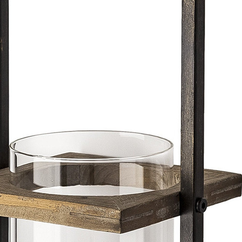 20" Black And Bronze Distressed Geometric Metal And Glass Wall Sconce Candle Holder. Candle holder isolated on a plain white background, showing a black glass surface.