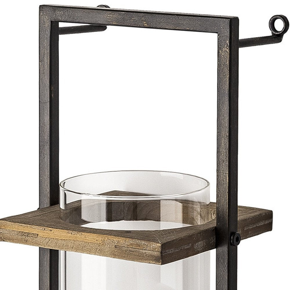 20" Black And Bronze Distressed Geometric Metal And Glass Wall Sconce Candle Holder. Candle holder isolated on a plain white background, finished in black glass.