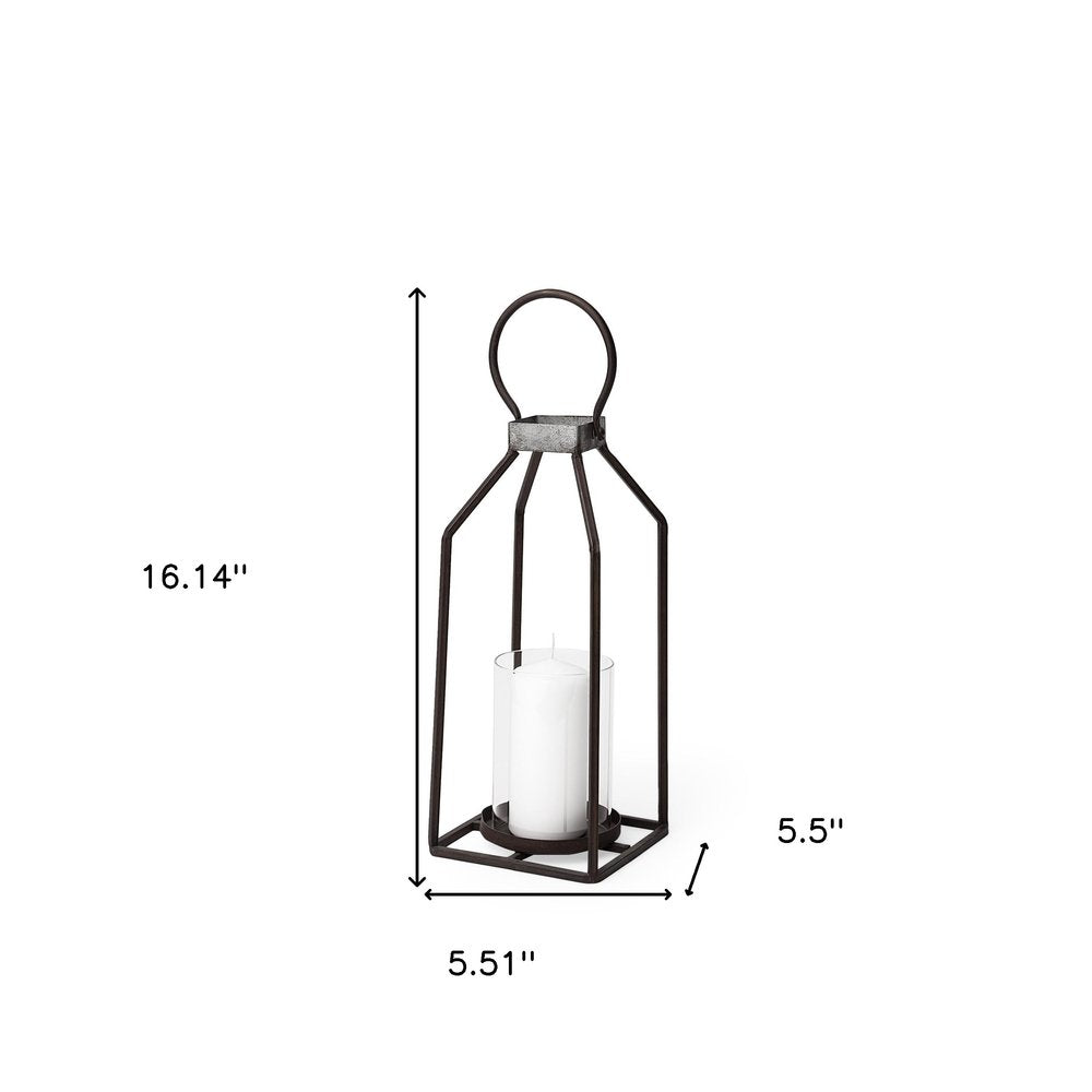 16" Black Distressed Geometric Metal And Glass Tabletop Votive Candle Holder. Candle holder isolated on a plain white background, showing a glass surface.