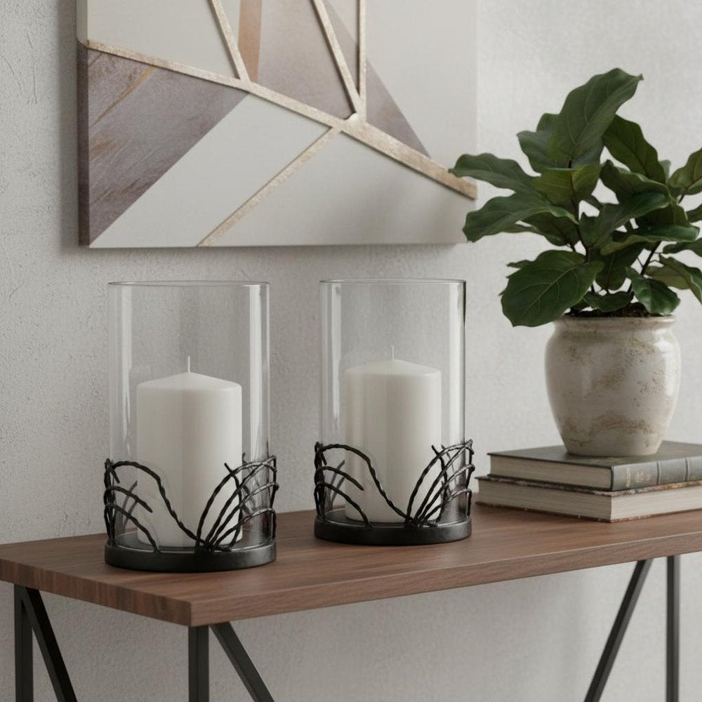 Set of Two Black Botanical Leaf Glass And Metal Tabletop Hurricane Candle Holders in a home interior