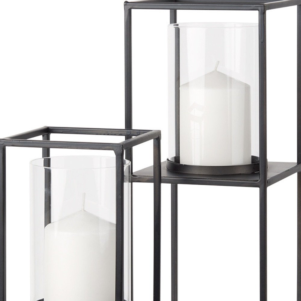 Set of Two Black Geometric Metal And Glass Tabletop Hurricane Candle Holders on a white background