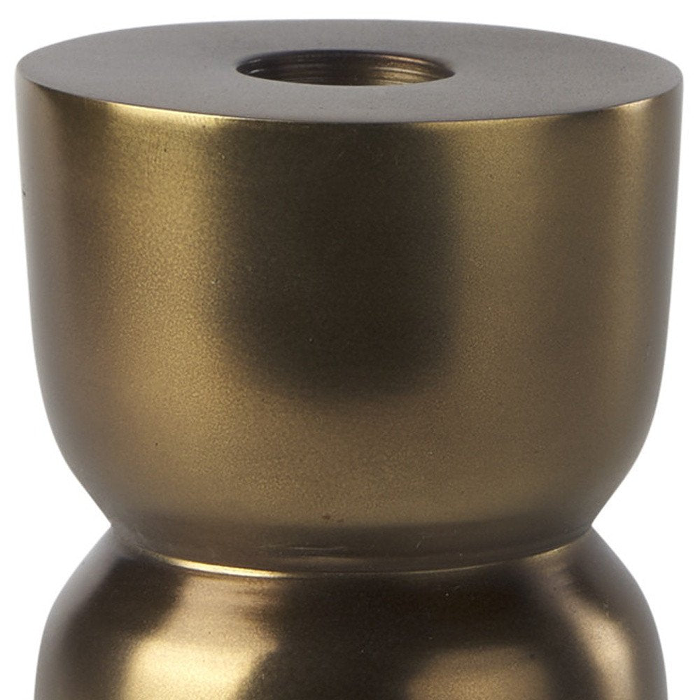 Cropped view of 5" Gold Metal Tabletop Taper Candlestick focusing on the metal surface.