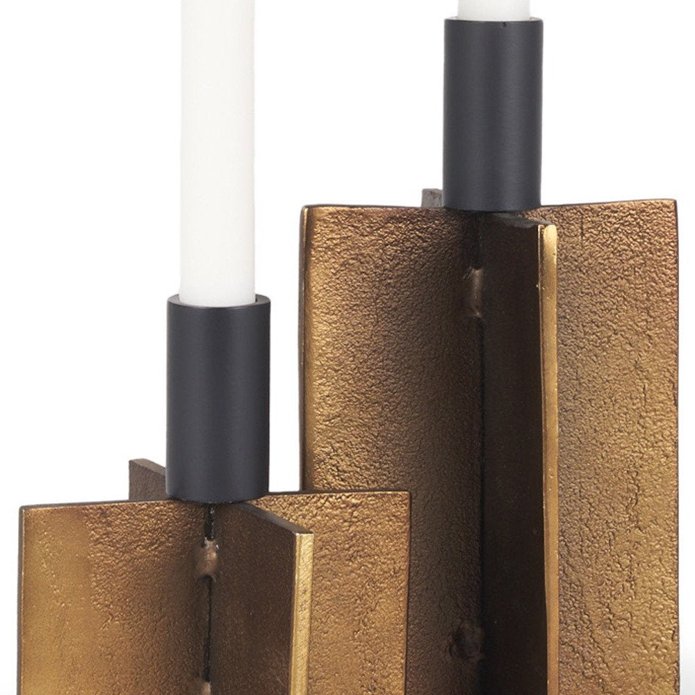 Set of Two Black And Antiqued Gold Distressed Geometric Metal Tabletop Taper Candle Holders on a white background