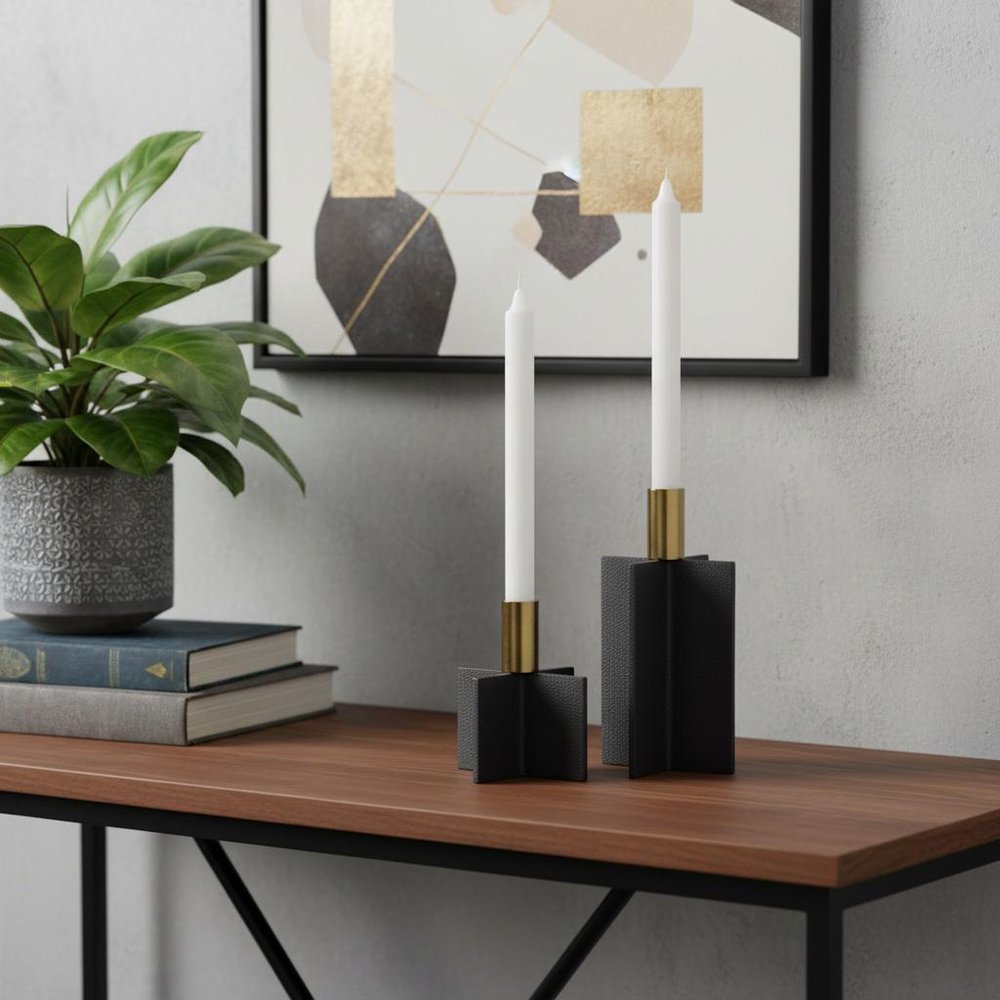Set of Two Black And Gold Geometric Metal Tabletop Taper Candle Holders in a home interior