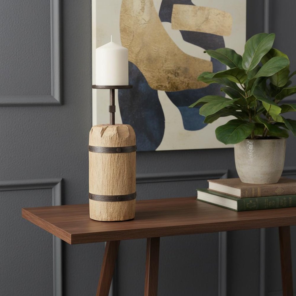 16" Brown Distressed Abstract Solid Wood Tabletop Pillar Candle Holder displayed on a tabletop in a furnished interior against a dark wall.