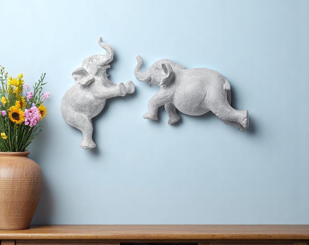 Set of Two Maynard I Gray Elephant Resin Hanging Dimensional Sculpture in a home interior
