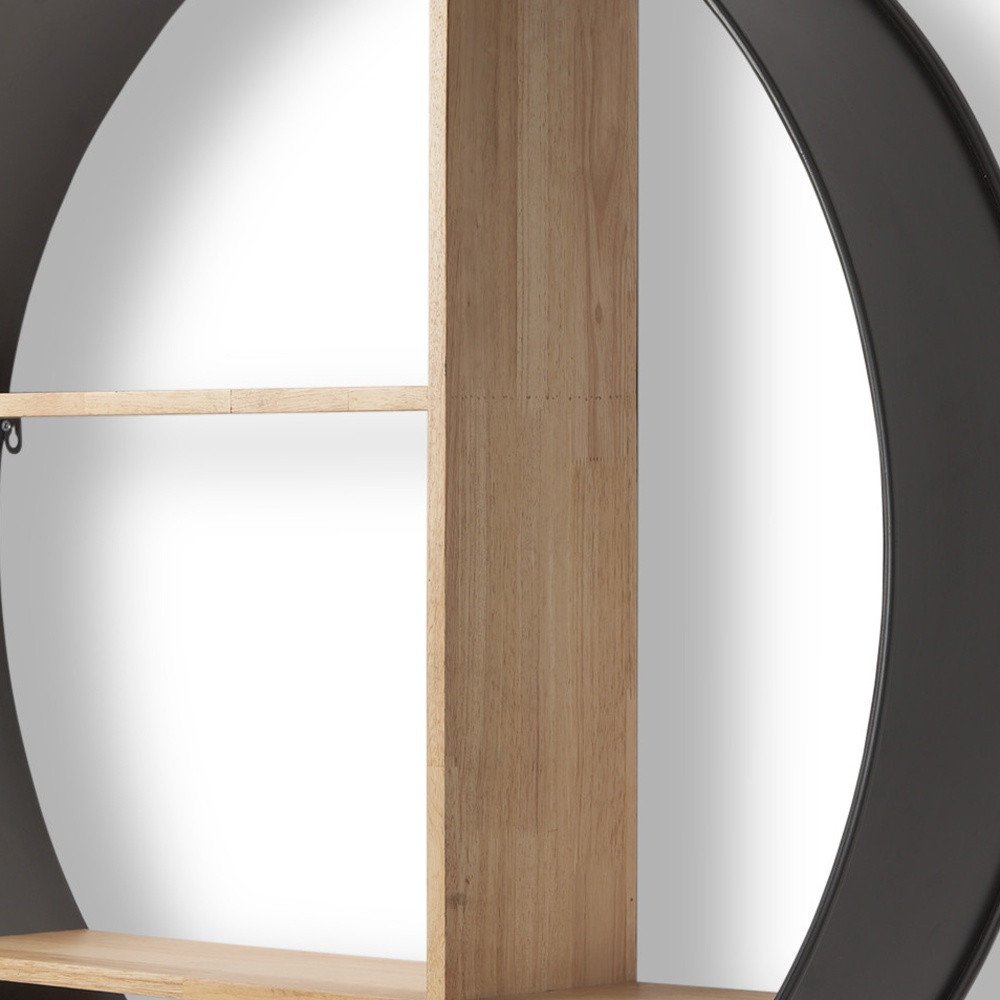 36" Black And Brown Metal And Wood Circular Multi Tier Shelf styled in a furnished interior with a dark wall on a charcoal floor.