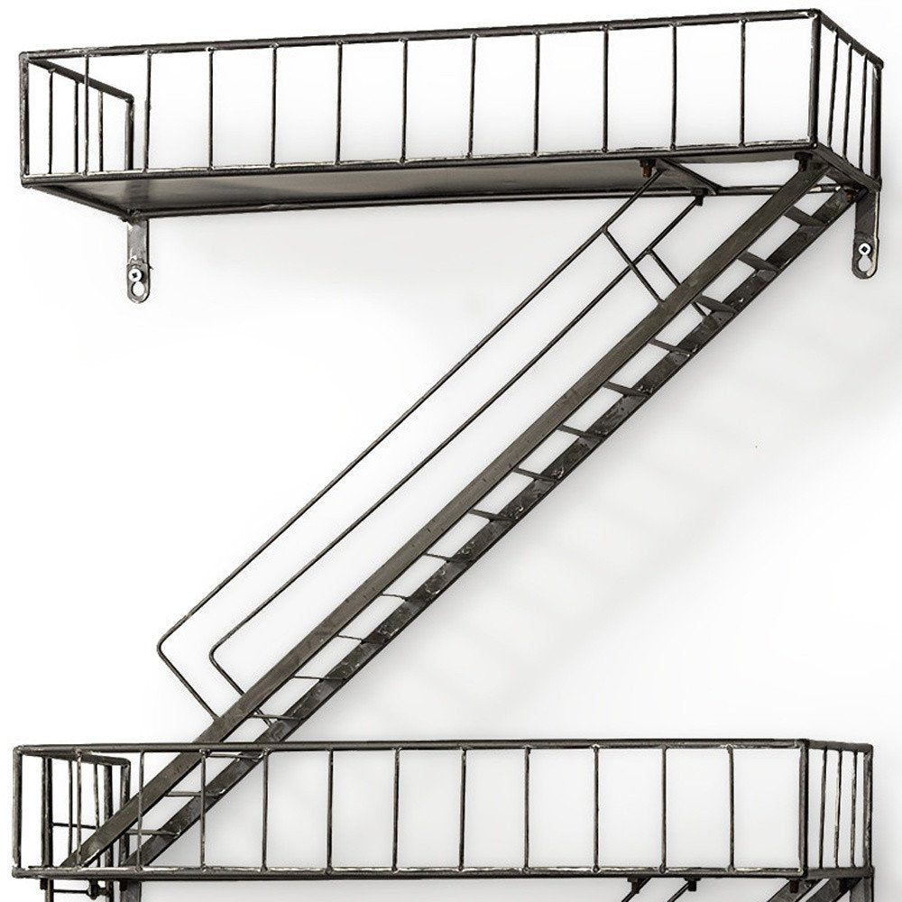 21" Gunmetal Gray Metal Novelty Wall Mounted Accent Shelf. Wall mounted shelve isolated on a plain white background, showing a gray metal surface.