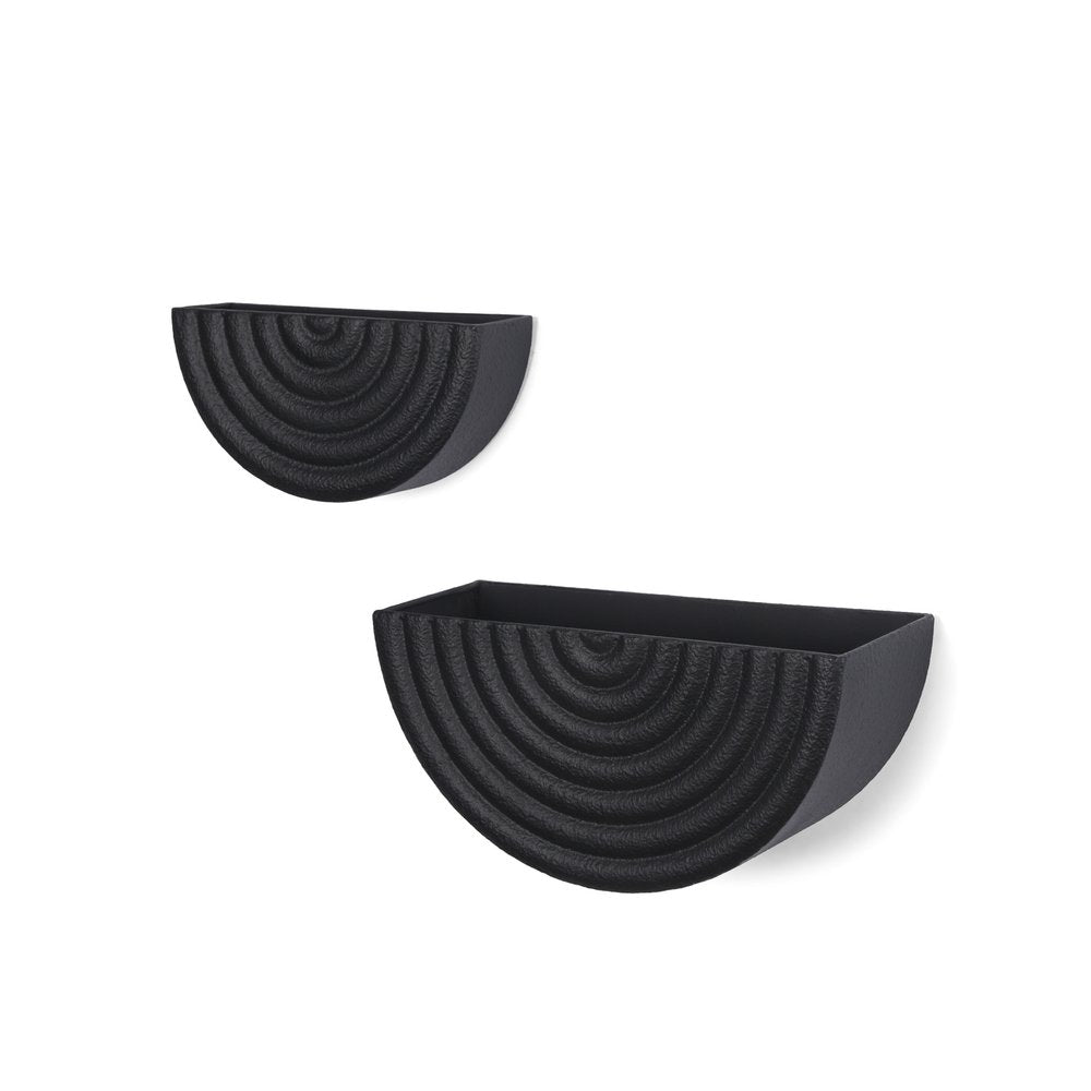 Two black metal half-moon wall planters with a textured geometric design on a white background.