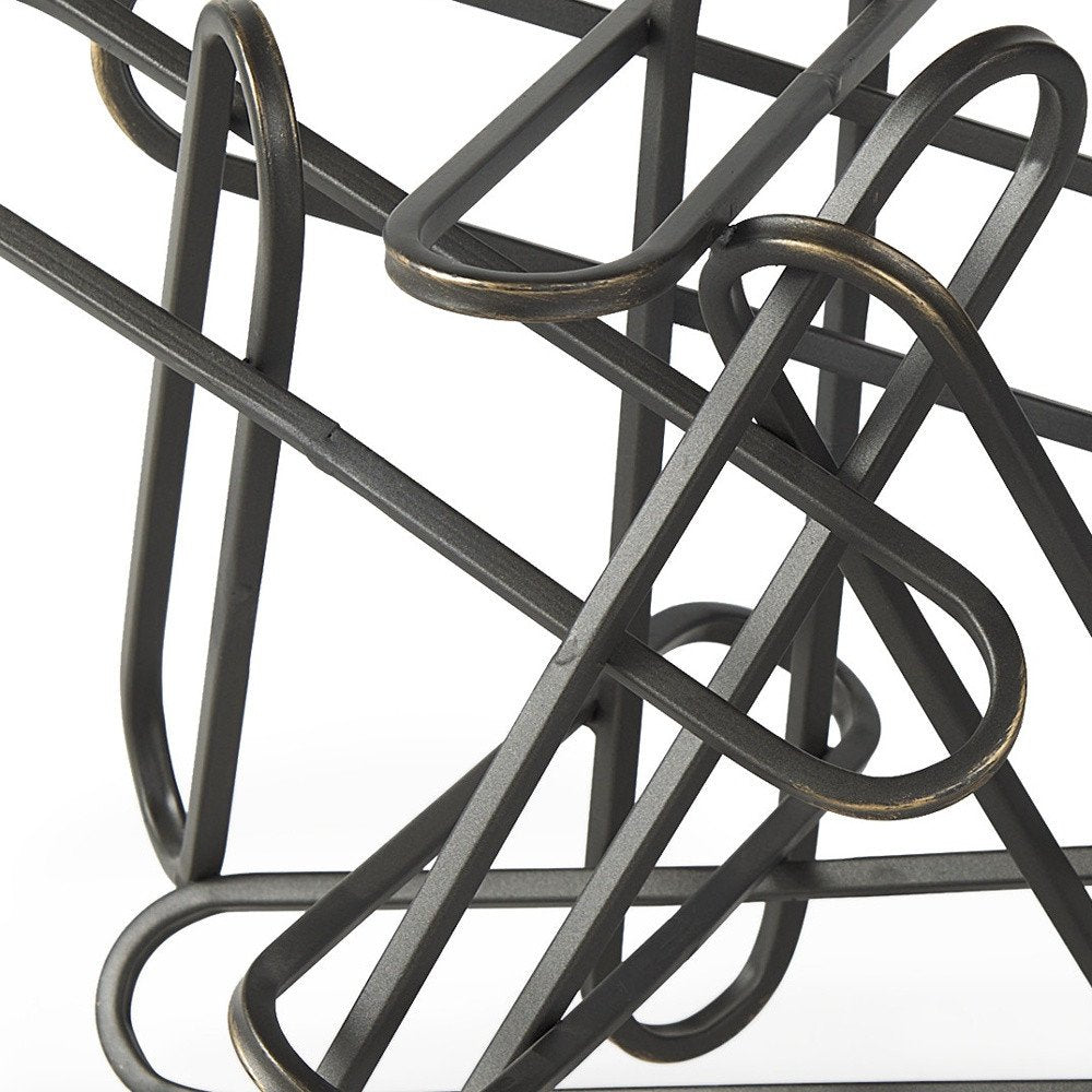 12" Black Metal Abstract Tabletop Sculpture. Sculpture isolated on a plain white background, finished in black metal.