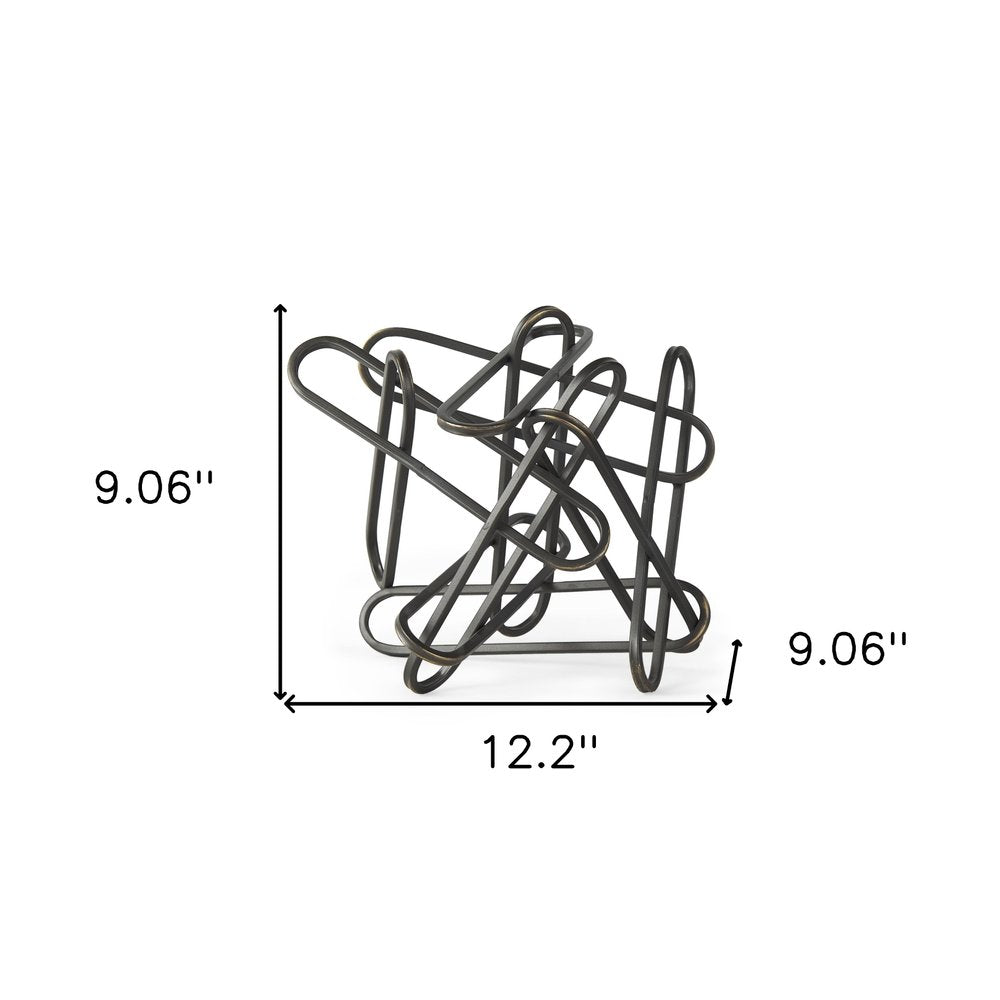 12" Black Metal Abstract Tabletop Sculpture. Sculpture isolated on a plain white background, in a black metal finish.