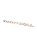 3" Beige Paper Sphere Tabletop Sculpture. Sculpture isolated on a plain white background, showing its beige color.