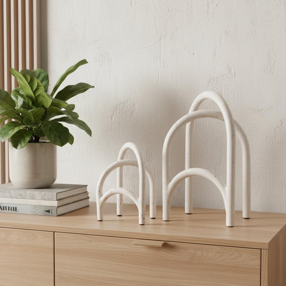 Set of Two White Iron Modern Abstract Tabletop Sculptures in a home interior