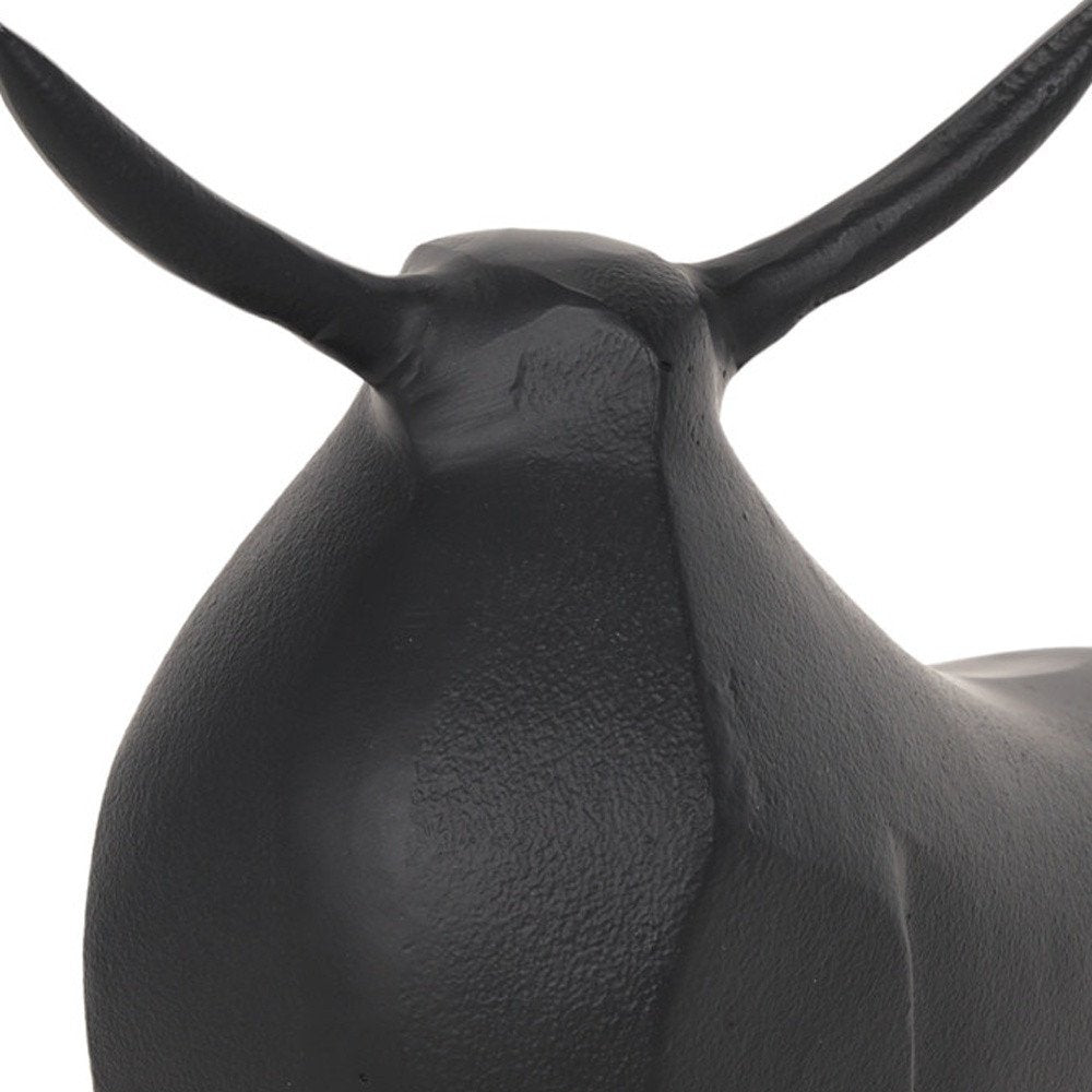 11" Black Aluminum Bull Tabletop Sculpture. Sculpture isolated on a plain white background, showing a black metal surface.