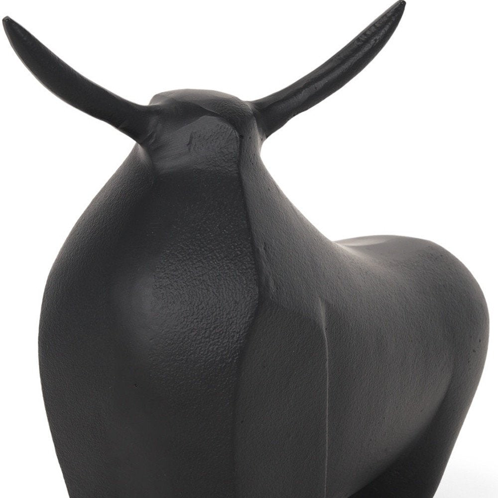 11" Black Aluminum Bull Tabletop Sculpture. Sculpture isolated on a plain white background, in a black metal finish.
