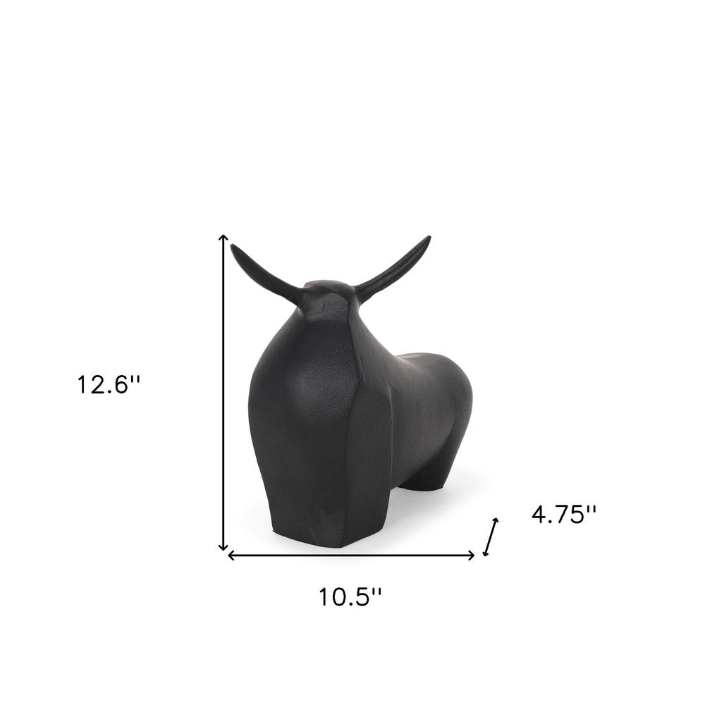 11" Black Aluminum Bull Tabletop Sculpture. Sculpture isolated on a plain white background, showing a black metal surface.
