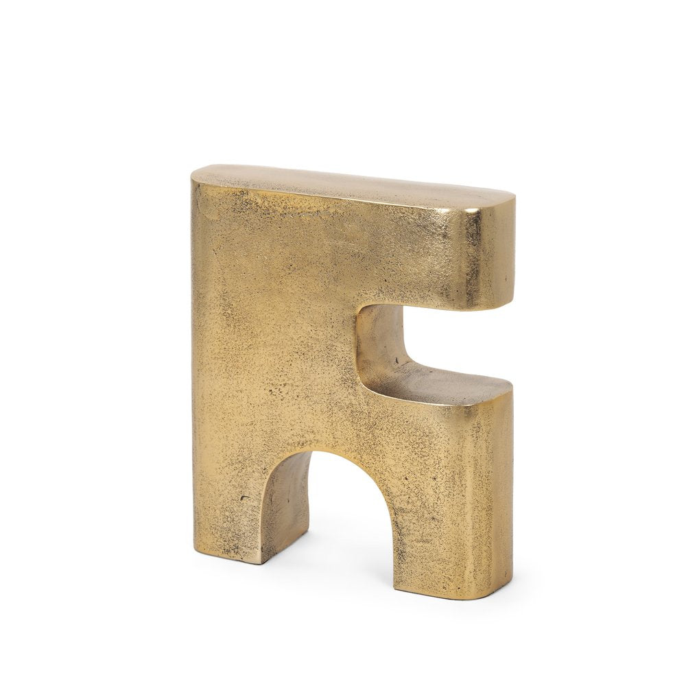 10" Brass Aluminum Tabletop Sculpture. Sculpture isolated on a plain white background, showing a metal surface.