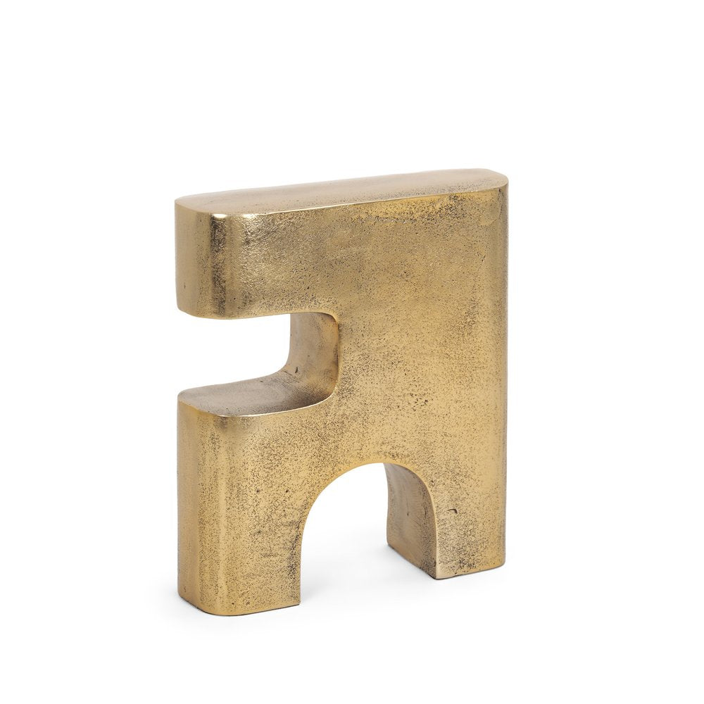 10" Brass Aluminum Tabletop Sculpture. Sculpture isolated on a plain white background, showing a metal surface.