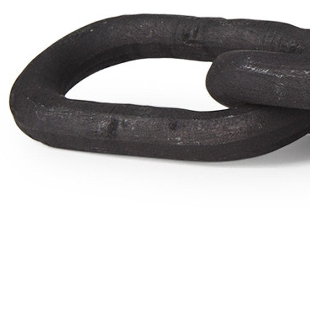 5" Black Solid Wood Tabletop Sculpture. Sculpture isolated on a plain white background, showing a black wood surface.