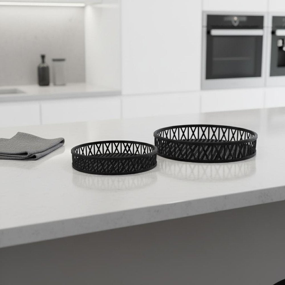 Set of Two Black Round Wicker Handmade Serving Trays in a home interior
