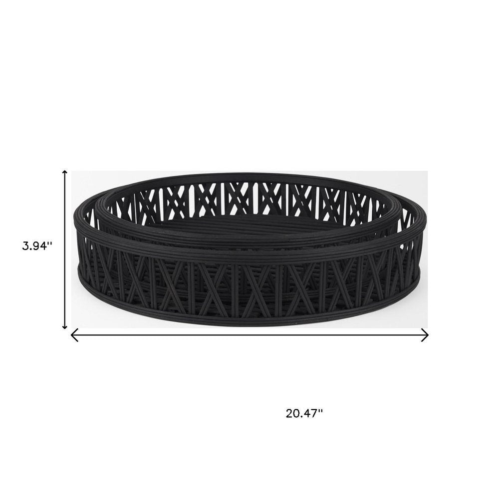 Set of Two Black Round Wicker Handmade Serving Trays on a white background