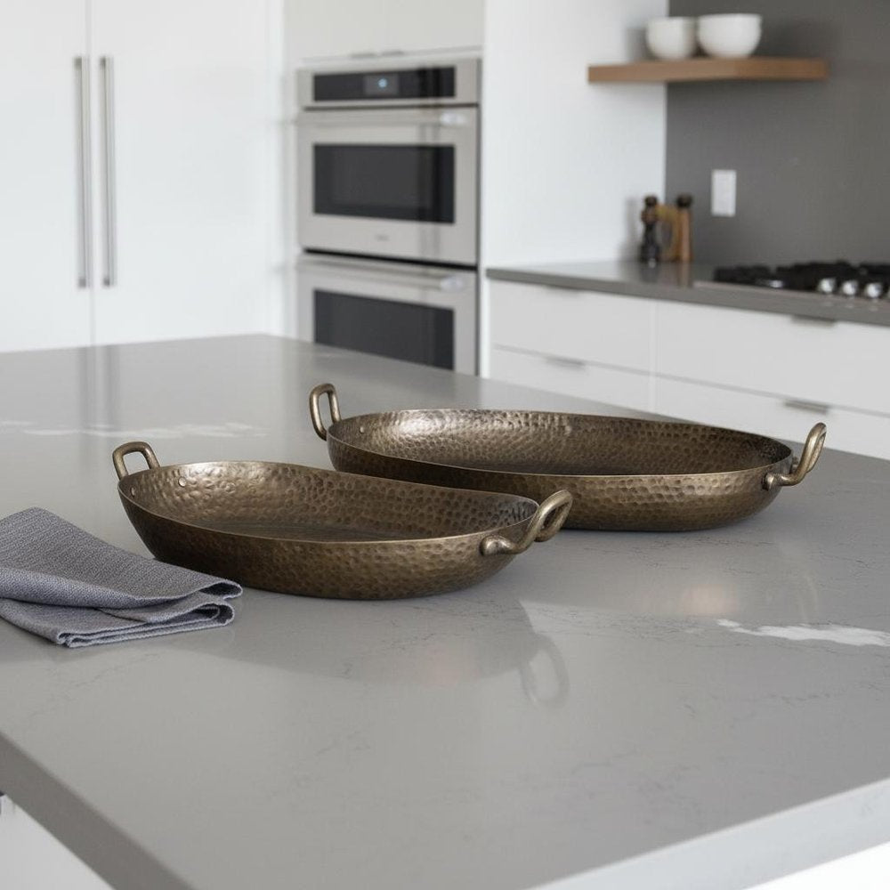 Set of Two Gold Oval Metal Handmade Serving Tray With Handles in a home interior