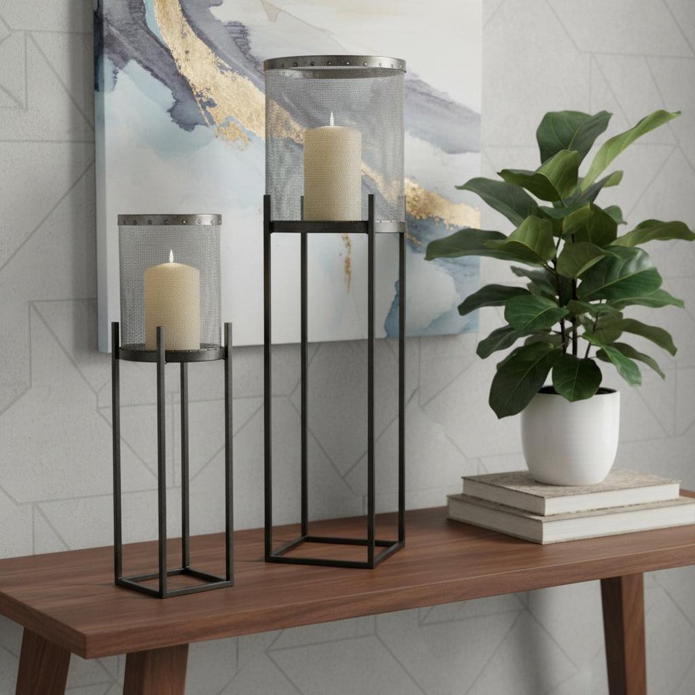 Set of Two Black Distressed Geometric Metal Lantern Candle Holders in a home interior
