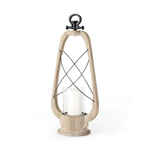A tall, light brown distressed wood and black metal lantern with a glass cylinder holding a white candle, on a white background.