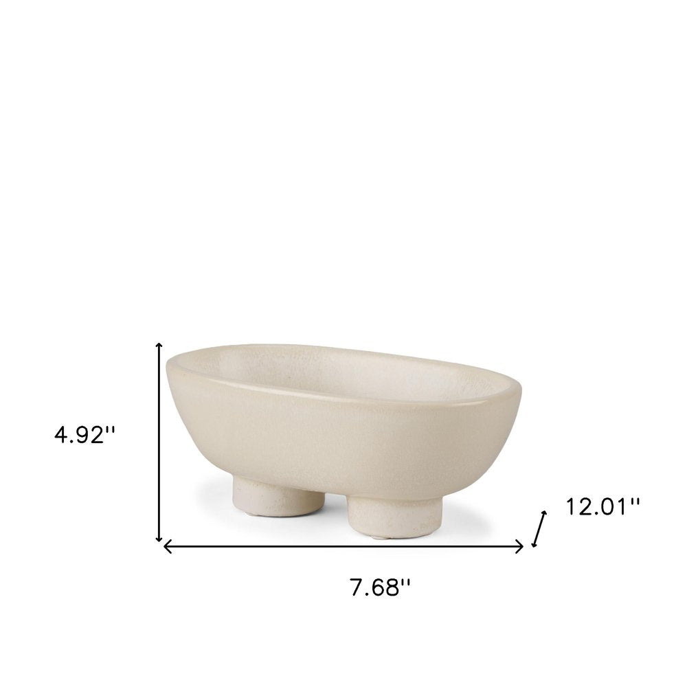 8" Cream Ceramic Oval Pedestal Centerpiece Bowl on a white background
