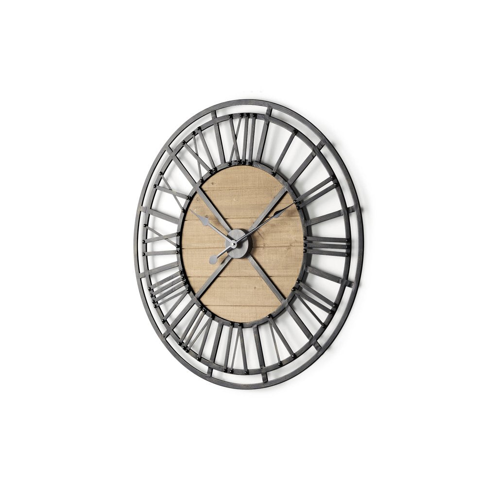 Black and natural iron and wood analog round wall clock on a white background.