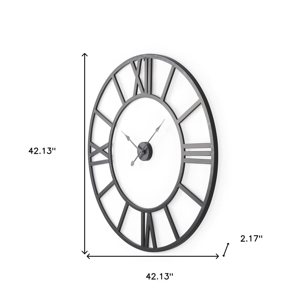 42" Black Iron Analog Round Wall Clock. Wall clock isolated on a plain white background, showing a metal surface.