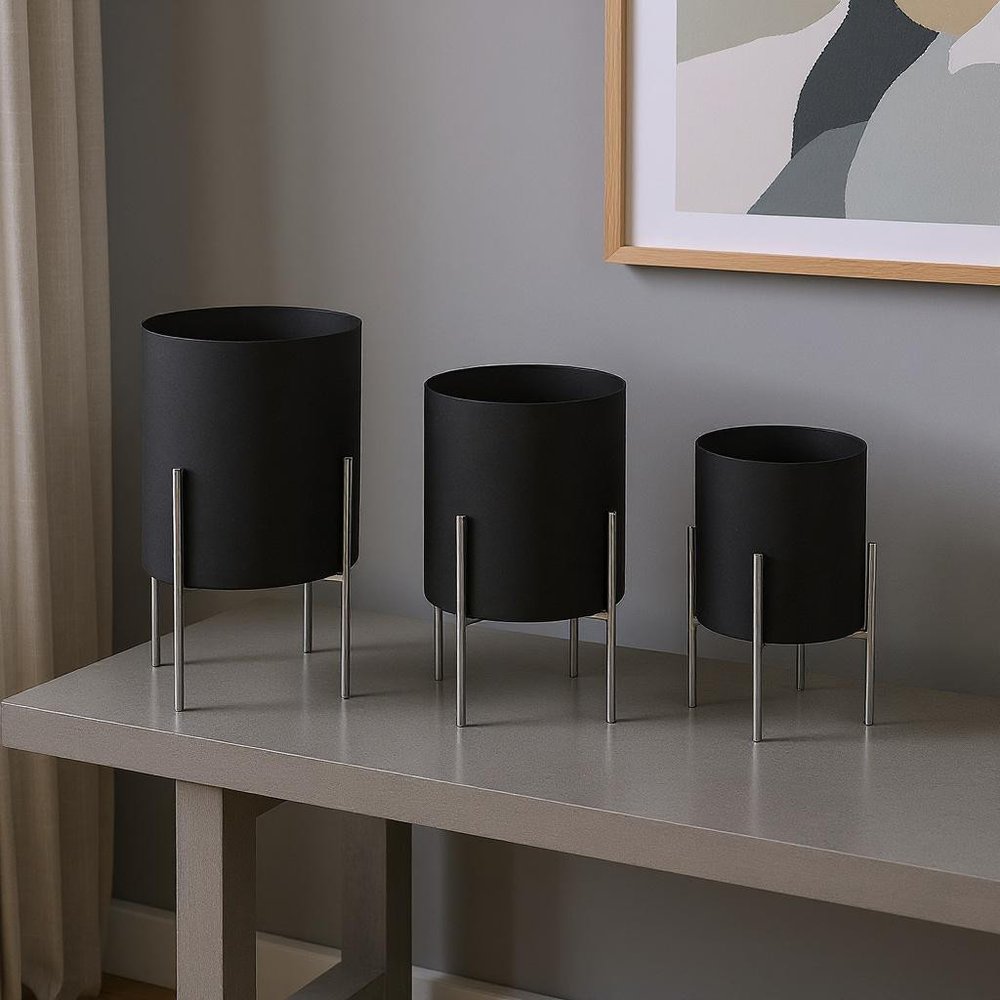 Set of Two Black Metal 20 Ounce Round Pot Planters - 24.5" H x 15" W x 15" D in a home interior