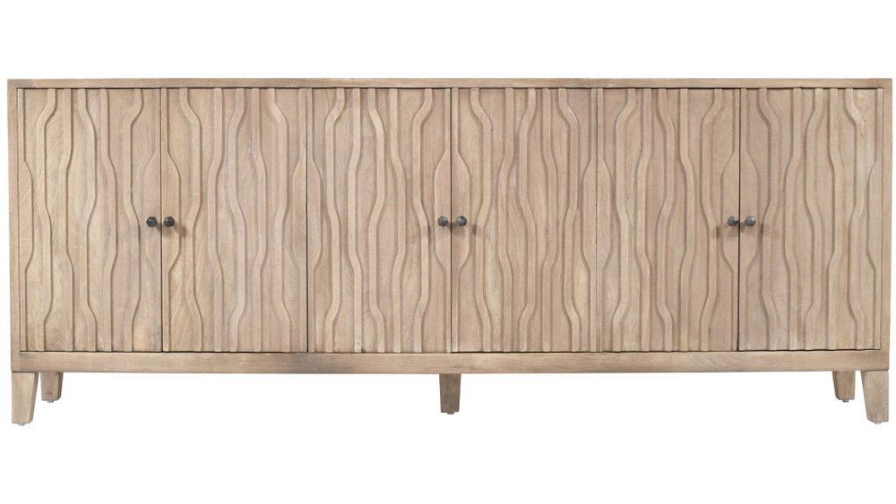 Light wood carved geometric sideboard with six doors on a white background.