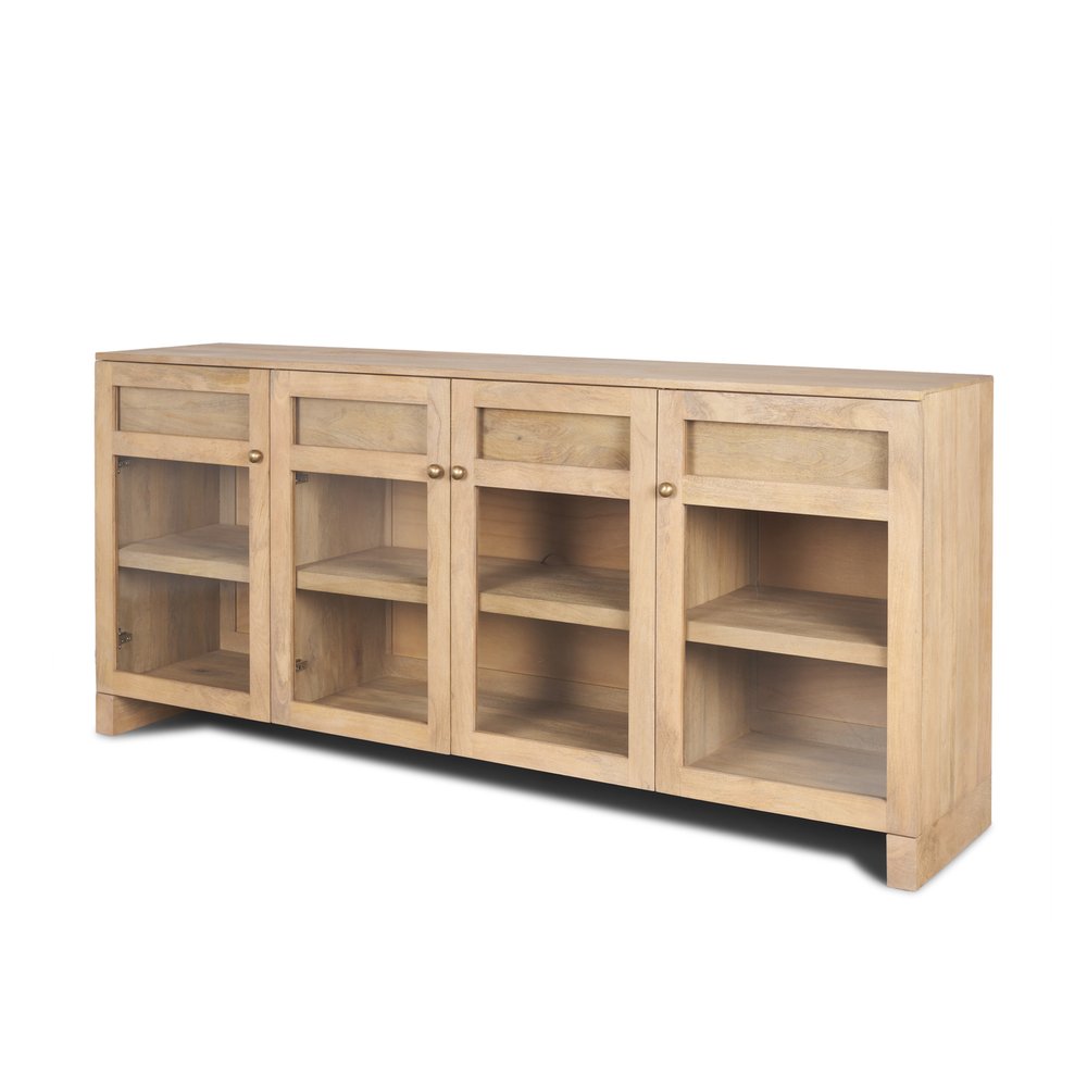 Light brown solid wood sideboard with four glass doors and visible shelves, set against a white background.