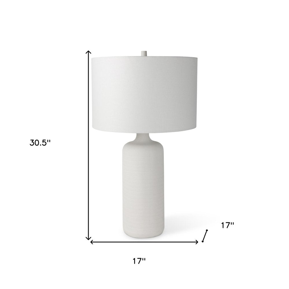 31" White Round Bedside Lamp With Drum Shade. Lamp isolated on a plain white background, showing its white color.