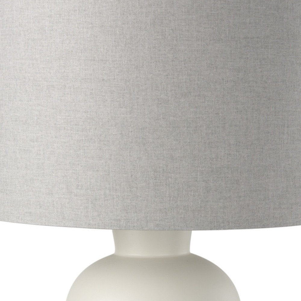 Close-up of 33" Cream Round Bedside Lamp With Drum Shade showing cream detail.