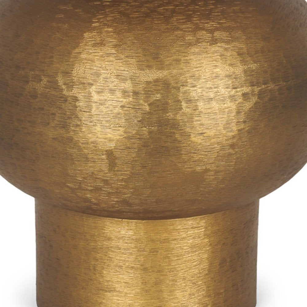 Cropped view of 26" Gold Round Bedside Lamp With Bell Shade focusing on the gold surface.