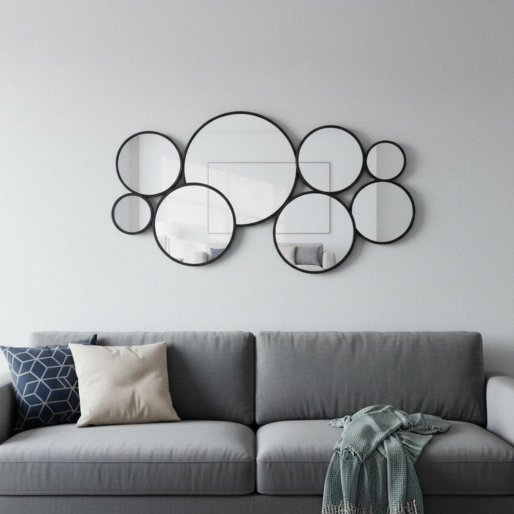 Set Of Eight Black Metal Round Cojoined Accent Mirrors in a home interior