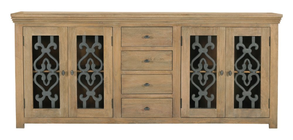 Natural distressed solid wood sideboard with four drawers and four glass doors featuring ornate metal inserts.
