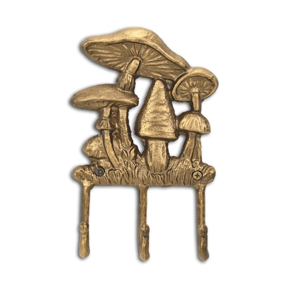 5" Antiqued Gold Cast Iron Mushroom Three Hook Wall Mount Coat Rack. Coat hanger isolated on a plain white background, showing a gold metal surface.