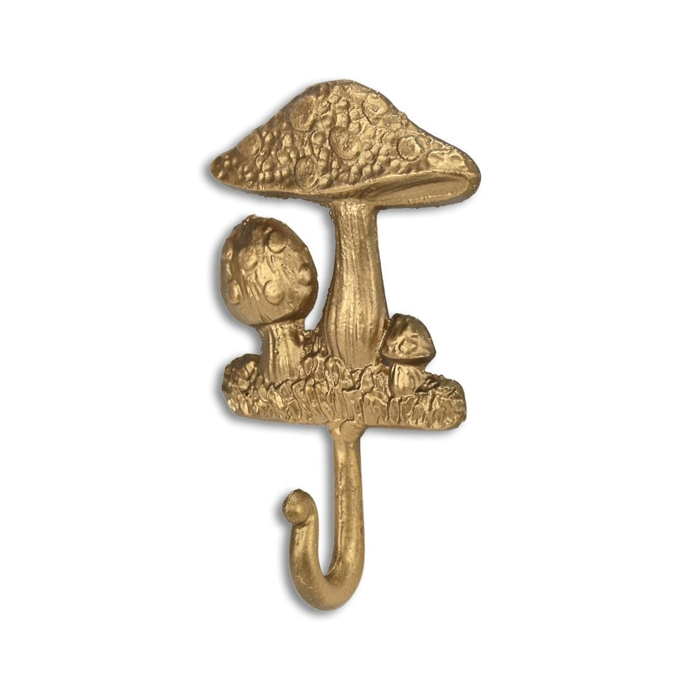 4" Gold Cast Iron Mushroom Wall Hook. Coat hanger isolated on a plain white background, finished in gold metal.