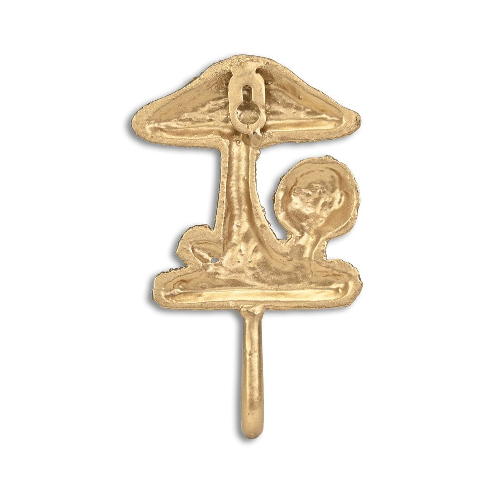 4" Gold Cast Iron Mushroom Wall Hook. Coat hanger isolated on a plain white background, showing a gold metal surface.