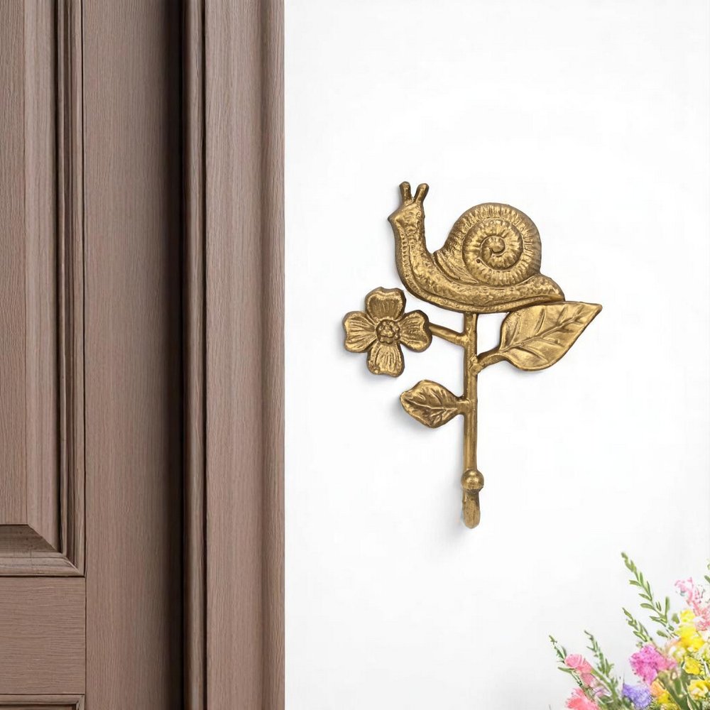 5" Gold Cast Iron Snail Wall Hook. Coat hanger in gold metal.