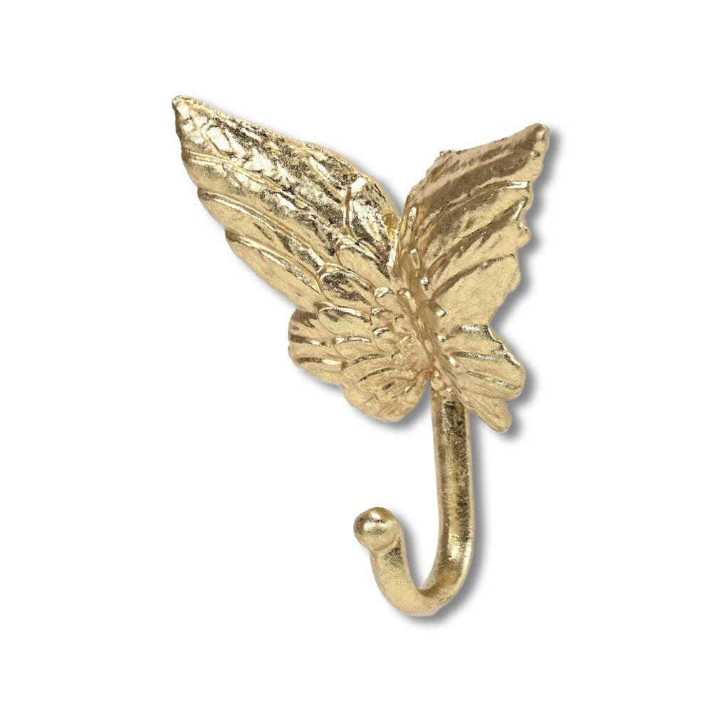 5" Gold Cast Iron Butterfly Wall Hook. Coat hanger isolated on a plain white background, finished in gold metal.