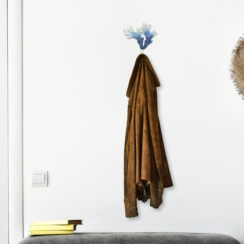 5" Blue And White Cast Iron Coral Wall Hook. Coat hanger isolated on a plain white background, in a white metal finish.