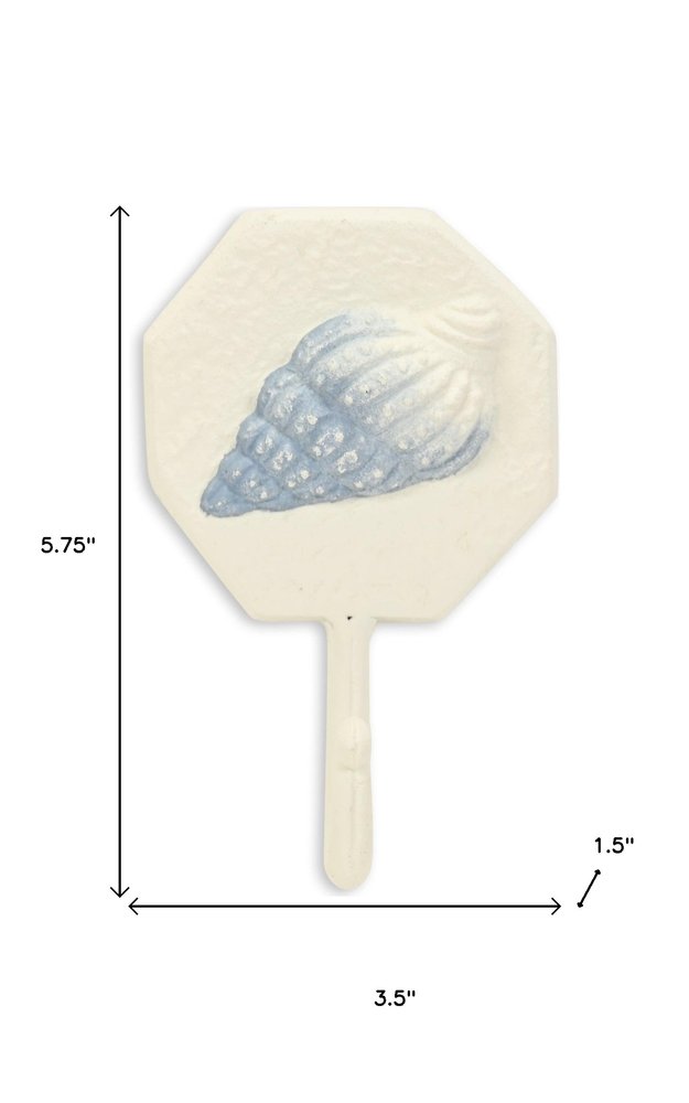 4" Blue And Cream Cast Iron Conch Shell Wall Hook. Coat hanger isolated on a plain white background, finished in cream metal.